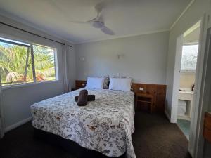 Voodi või voodid majutusasutuse Fletcher Christian Apartments - Isabella Suites toas +29 fotot