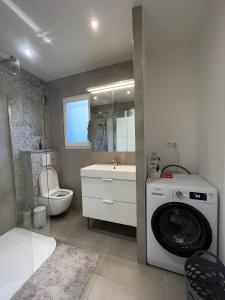 Ένα μπάνιο στο Villa 3 palmiers