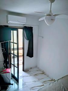 Ένα ή περισσότερα κρεβάτια σε δωμάτιο στο Condomínio Residencial Marbelle