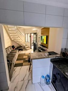 Η κουζίνα ή μικρή κουζίνα στο Condomínio Residencial Marbelle