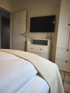 Ένα ή περισσότερα κρεβάτια σε δωμάτιο στο Fernblick