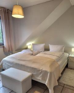 Ένα ή περισσότερα κρεβάτια σε δωμάτιο στο Fernblick