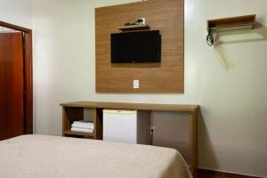 TV a/nebo společenská místnost v ubytování Pousada do Peralta