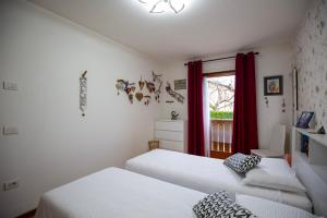 Giường trong phòng chung tại Casa Shiva