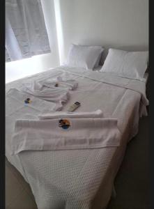 Ένα ή περισσότερα κρεβάτια σε δωμάτιο στο Boas vindas