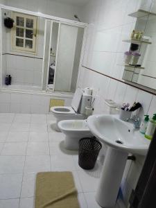 Koupelna v ubytování Chambre Douillet Pour Nuit Complice