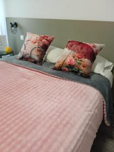 Ένα ή περισσότερα κρεβάτια σε δωμάτιο στο Aveiro Ria View