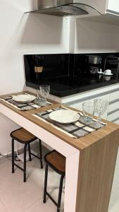 Køkken eller tekøkken på Seu Cantinho Premium no Centro Academia / Piscina