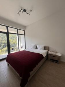 Ένα ή περισσότερα κρεβάτια σε δωμάτιο στο Apartment 33