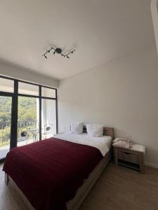 Ένα ή περισσότερα κρεβάτια σε δωμάτιο στο Apartment 33