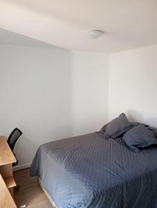 Ένα ή περισσότερα κρεβάτια σε δωμάτιο στο Departamento a pasos de la playa, Cap 6 personas +1 φωτογραφίες