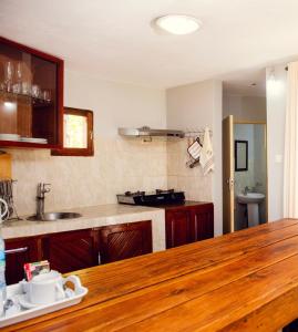 Η κουζίνα ή μικρή κουζίνα στο Lagoon Bay Chidenguele +15 φωτογραφίες