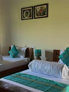 Ένα ή περισσότερα κρεβάτια σε δωμάτιο στο The Highway One