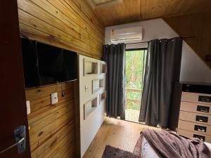 Ένα ή περισσότερα κρεβάτια σε δωμάτιο στο Casa de lujo cerca de la playa