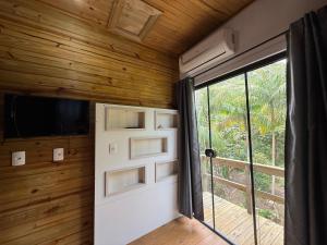 Afbeelding uit fotogalerij van Casa de lujo cerca de la playa in Garopaba +6 foto's