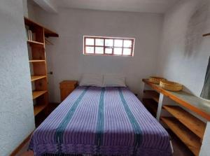 Ένα ή περισσότερα κρεβάτια σε δωμάτιο στο Apartamento Panajachel