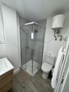 Ένα μπάνιο στο Apartamento junto al mar El Galeón