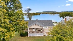 an aerial view of a house with a lake at All Seasons Resort with Lake Access in Georgetown