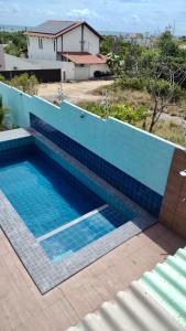 Πισίνα στο ή κοντά στο Flat PRAIA DO AMOR JACUMÃ +15 φωτογραφίες