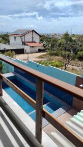 Πισίνα στο ή κοντά στο Flat PRAIA DO AMOR JACUMÃ