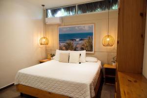 Ένα ή περισσότερα κρεβάτια σε δωμάτιο στο Hotel Michanti