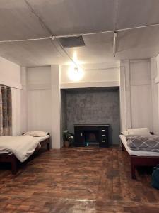 Ένα ή περισσότερα κρεβάτια σε δωμάτιο στο Ane homestay