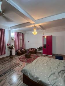 Ένα ή περισσότερα κρεβάτια σε δωμάτιο στο Ane homestay