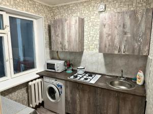 Η κουζίνα ή μικρή κουζίνα στο SeaPoint 22