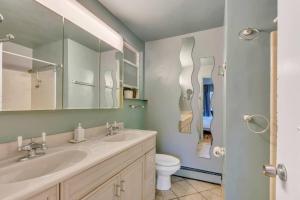 a bathroom with a sink and a toilet at Capitol Retreats-views! Near Salt Palace,sleep 28 in Salt Lake City +101 photos