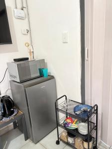 Kuchyň nebo kuchyňský kout v ubytování Hlones place