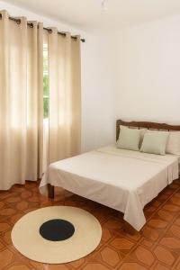 Ένα ή περισσότερα κρεβάτια σε δωμάτιο στο My Friends Place