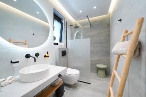 Et badeværelse på Aurea Mare Luxury Suites