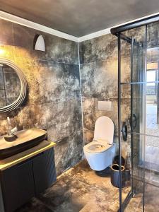 Ένα μπάνιο στο Modatepe Bungalow & Otel