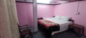 Giường trong phòng chung tại Hills Heaven Homestay