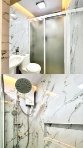 Ένα μπάνιο στο Relaxing 2BR Home Village Stay