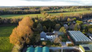 an overhead view of a house in a field with trees at Hidden Acres- Deluxe Double Room in Malahide