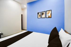 Ένα ή περισσότερα κρεβάτια σε δωμάτιο στο HOTEL O L R +21 φωτογραφίες