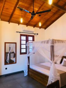 Ένα ή περισσότερα κρεβάτια σε δωμάτιο στο Villa Balcony Bliss