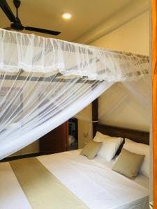 Ένα ή περισσότερα κρεβάτια σε δωμάτιο στο Villa Balcony Bliss