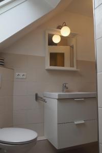 Ένα μπάνιο στο Appartment Buntspecht - Gemütliche Ferienwohnung, Direkt am Wald, Nähe zur Altstadt