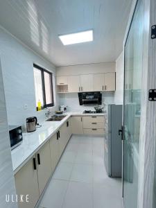 Η κουζίνα ή μικρή κουζίνα στο Appartements Haut-Standing de la Riviéra