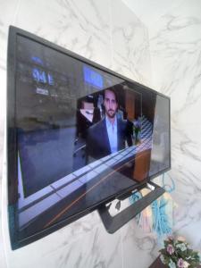 Μια τηλεόραση ή/και κέντρο ψυχαγωγίας στο Aracaju Suite - Seu Conforto no Coração da Capital +17 φωτογραφίες