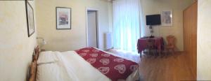 Postel nebo postele na pokoji v ubytování Meuble Villa Neve