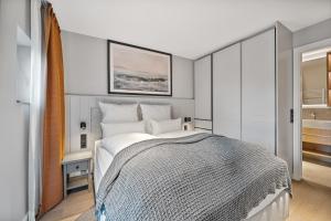 Ένα ή περισσότερα κρεβάτια σε δωμάτιο στο Alte Schule Westerhever Westerhever