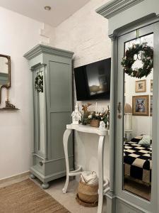 TV a/nebo společenská místnost v ubytování Casa Veranda sul mare