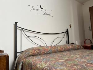 Кровать или кровати в номере Casa Modica vista Etna