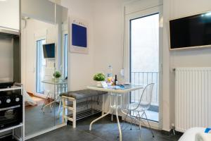 Sjónvarps- og/eða afþreyingartæki á Hippodrome Cute - Blue