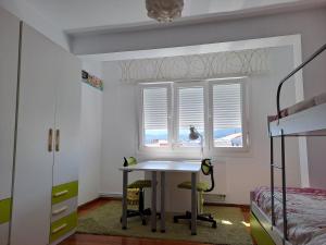 Ένα ή περισσότερα κρεβάτια σε δωμάτιο στο Torre Plaza 4 +4 φωτογραφίες