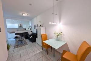 Kuchyň nebo kuchyňský kout v ubytování Ferienwohnung im Kurviertel 504 + 4 fotografie