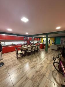 a dining room with a table and chairs at Quinta La Ramona in Candelaria